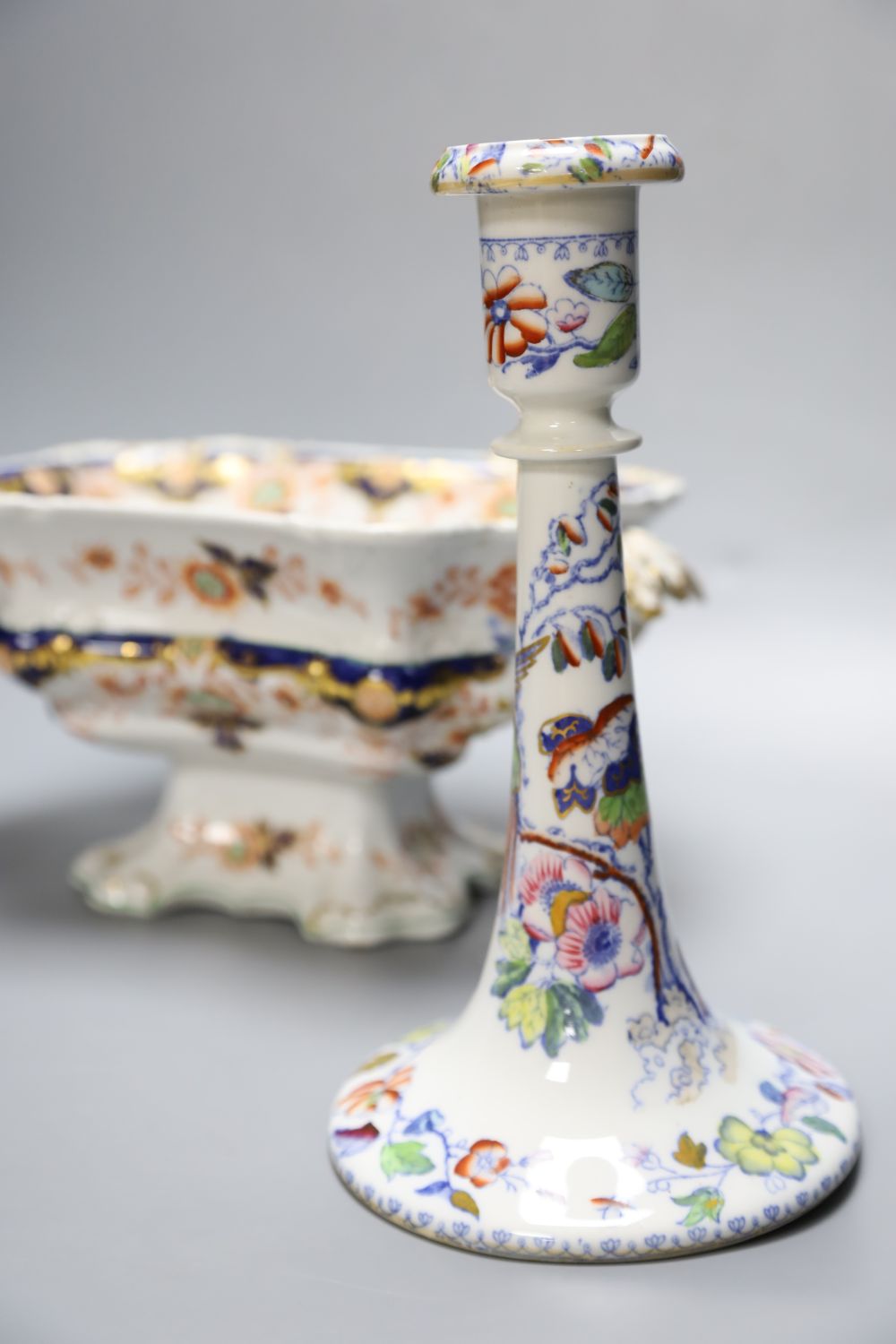 A pair of Masons Ironstone Flying Bird pattern candlesticks and a 19th century Imari pattern tureen (a.f.)